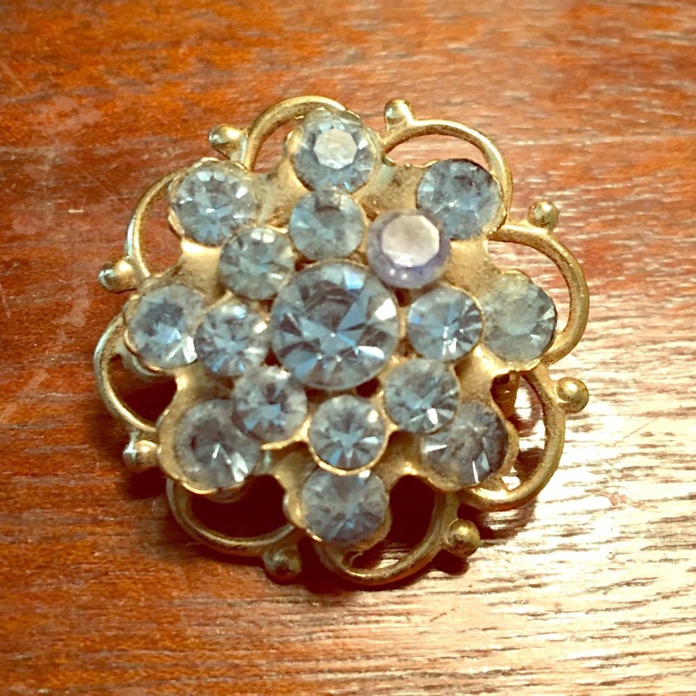 Vintage blue rhinestone brooch.